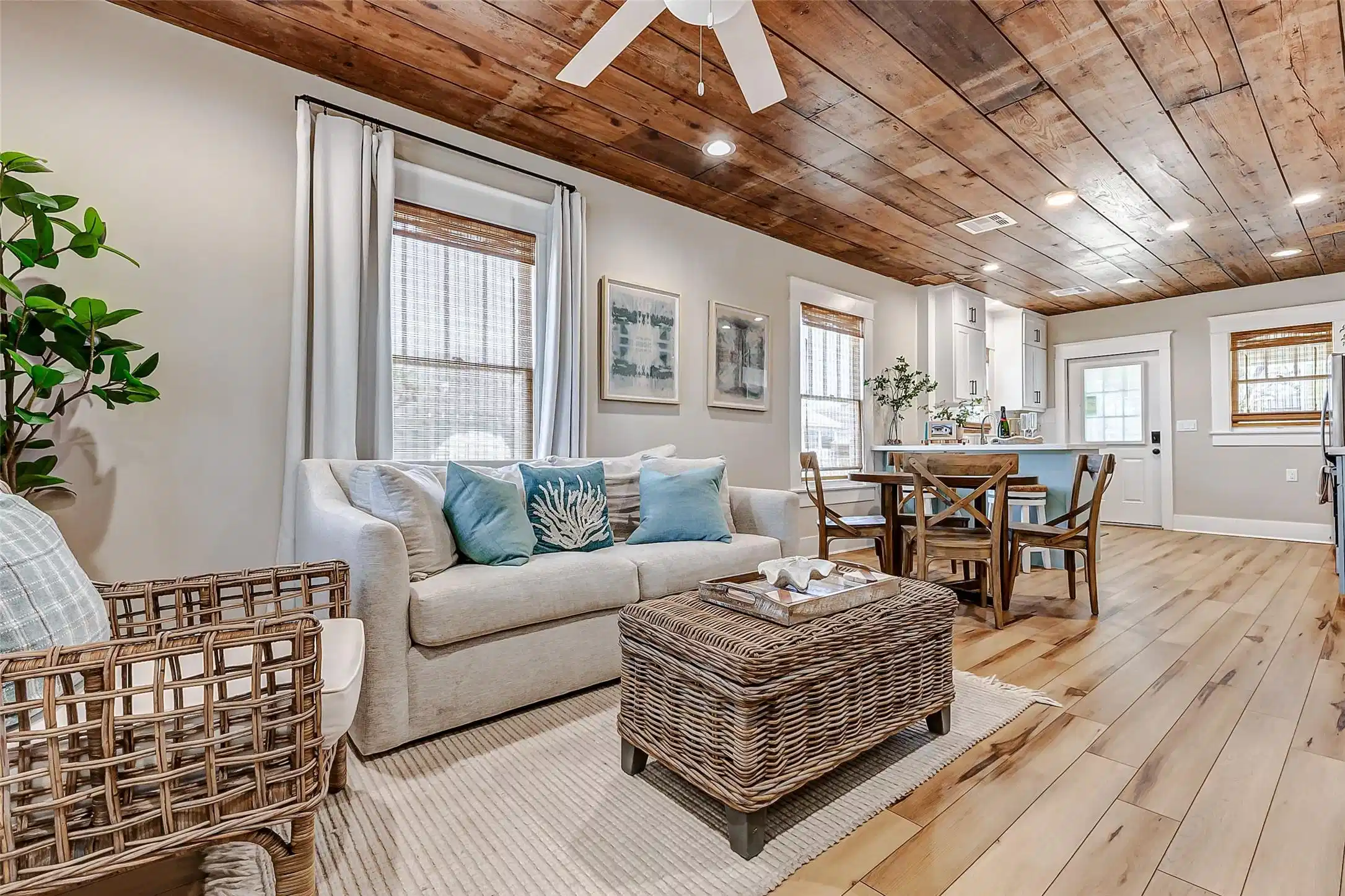 Image 1: The open-concept living area offers easy flow into