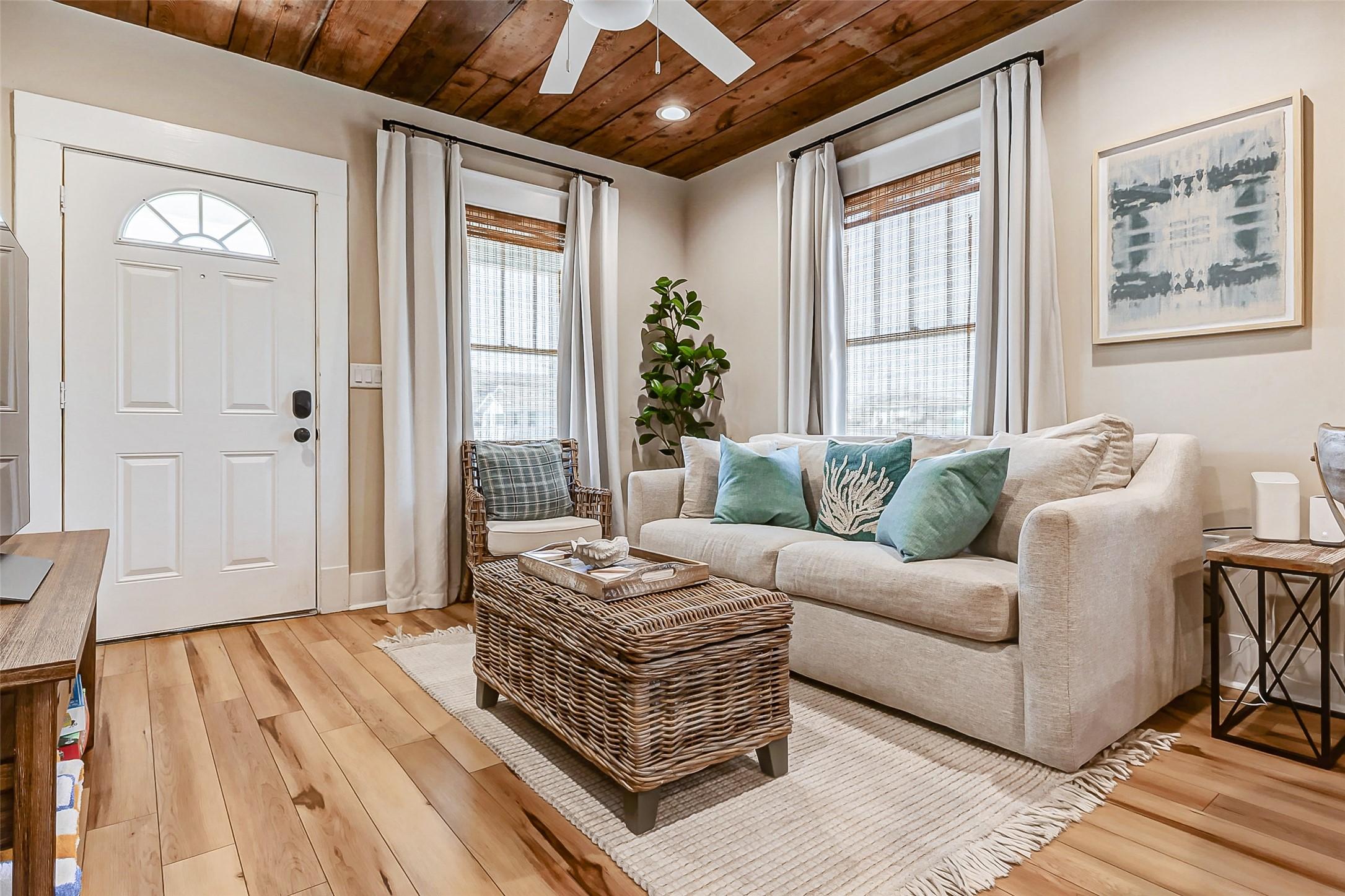Image 2: Soft natural light fills the living space, enhanci