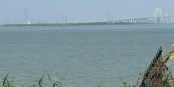 Image 2: Water views are across from subject.