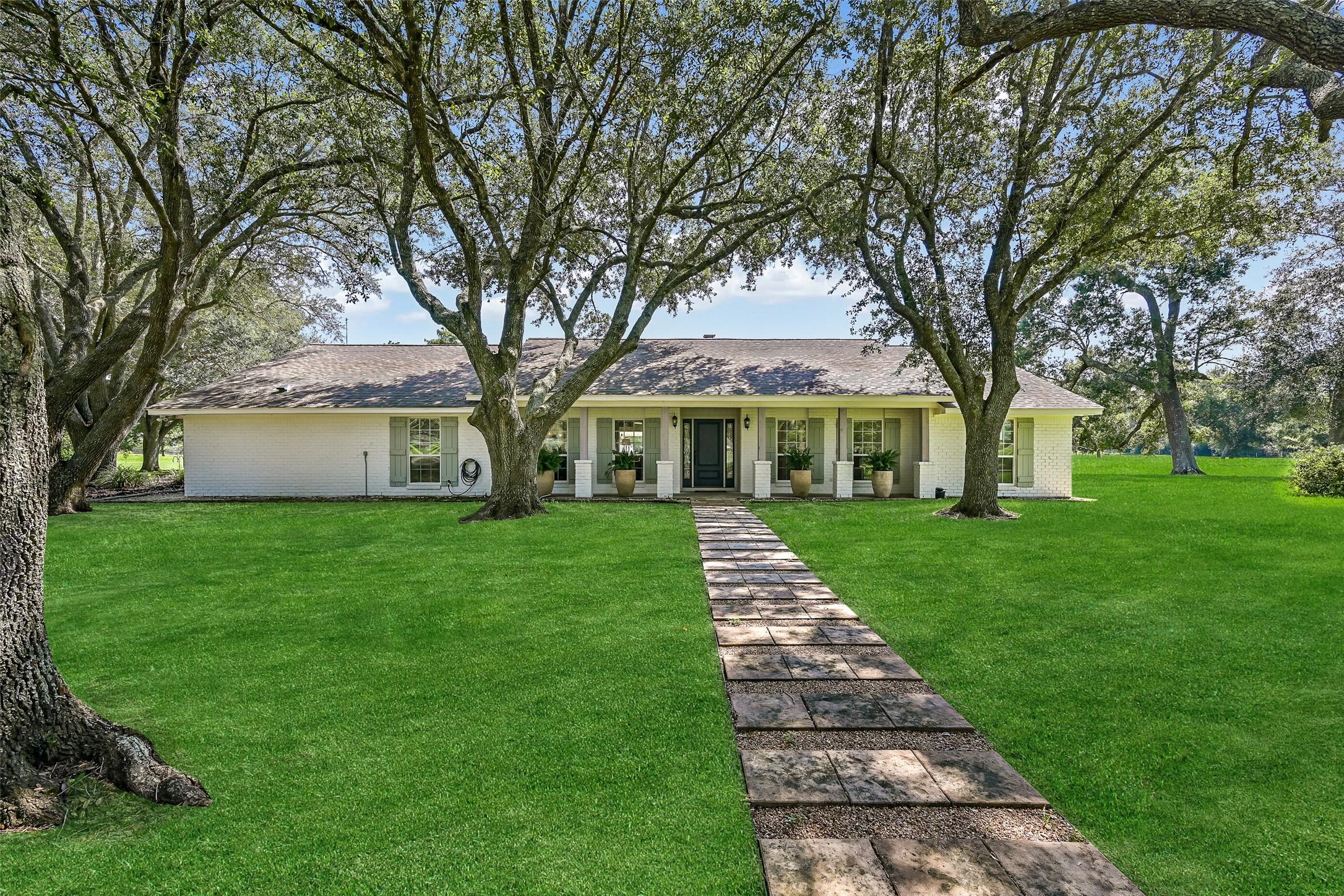 Image 4: Explore this stunning 5-bedroom, 5.5-bath ranch-st