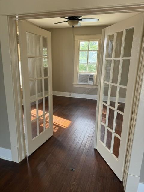 Image 4: French doors open into the dining room.