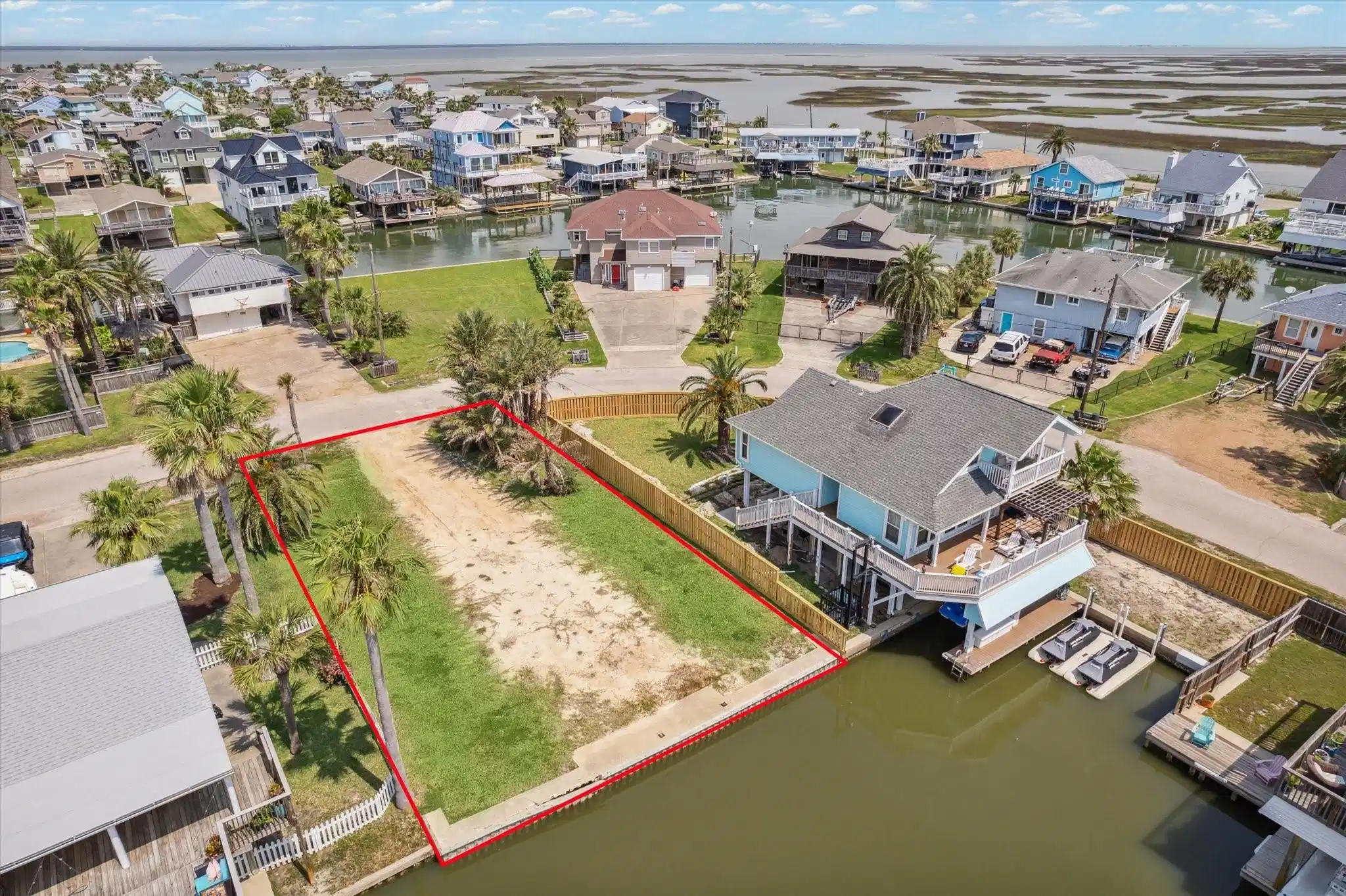Image 1: Prime waterfront lot with direct canal access, per