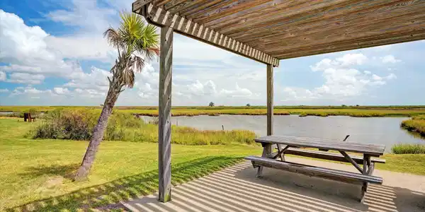 Image 4: Enjoy serene waterfront views from this charming n