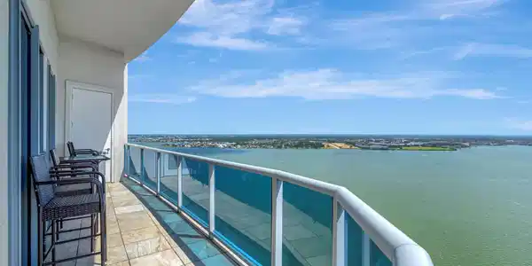 Image 2: This extended balcony offers ample space for enter