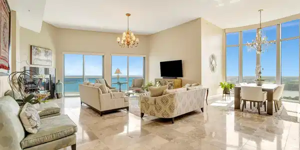 Image 3: Spacious open-concept living and dining area with