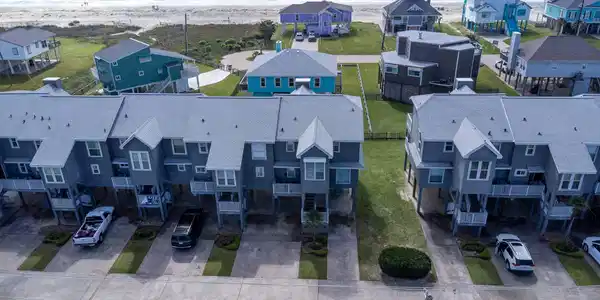 Image 2: These beachfront townhouses offer a picturesque vi
