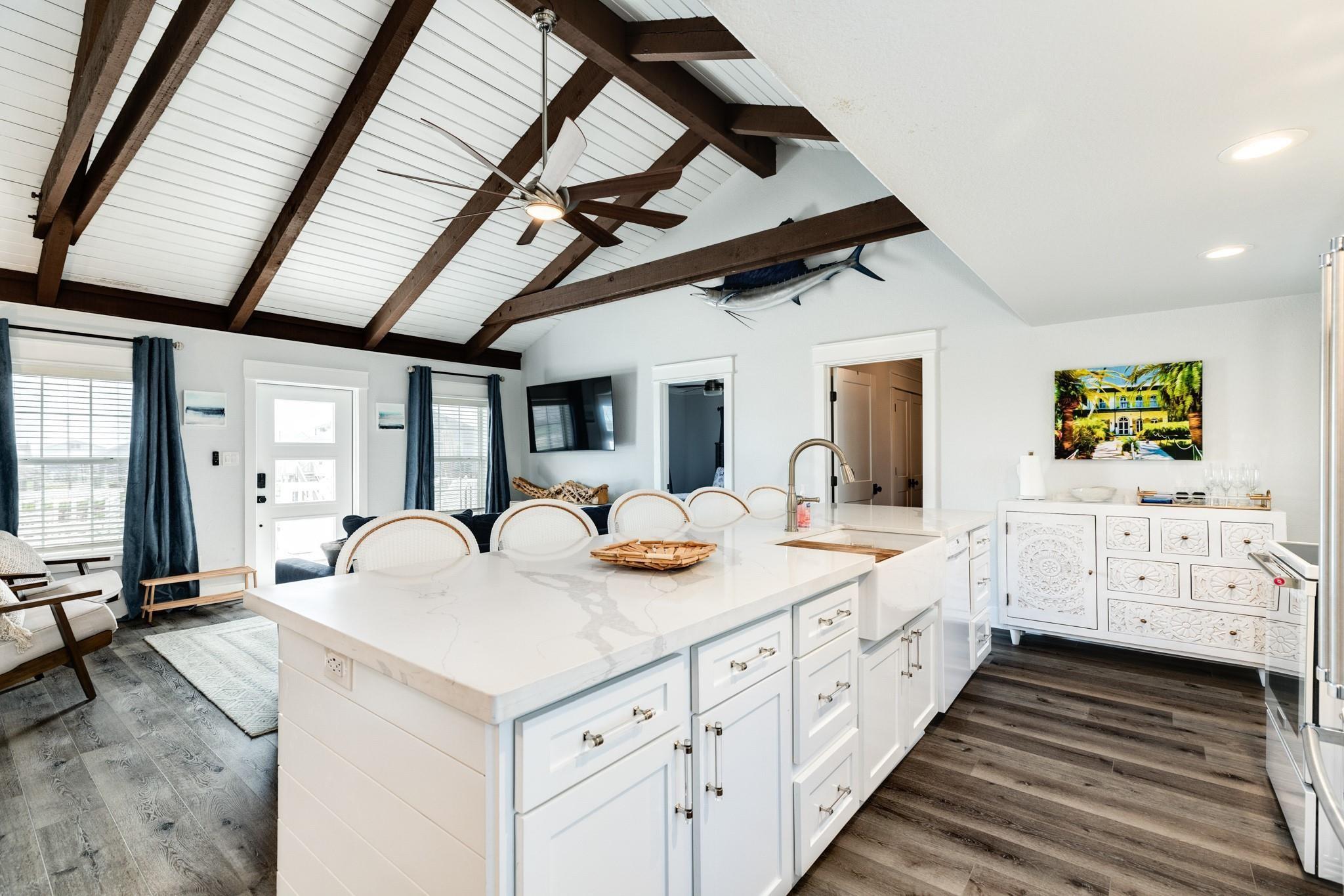 Image 4: The heart of the home! This stunning kitchen featu