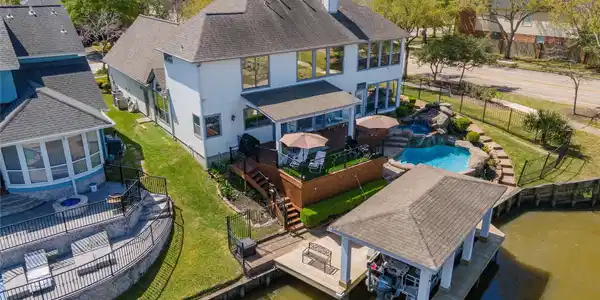Image 3: Property includes a boathouse with lift