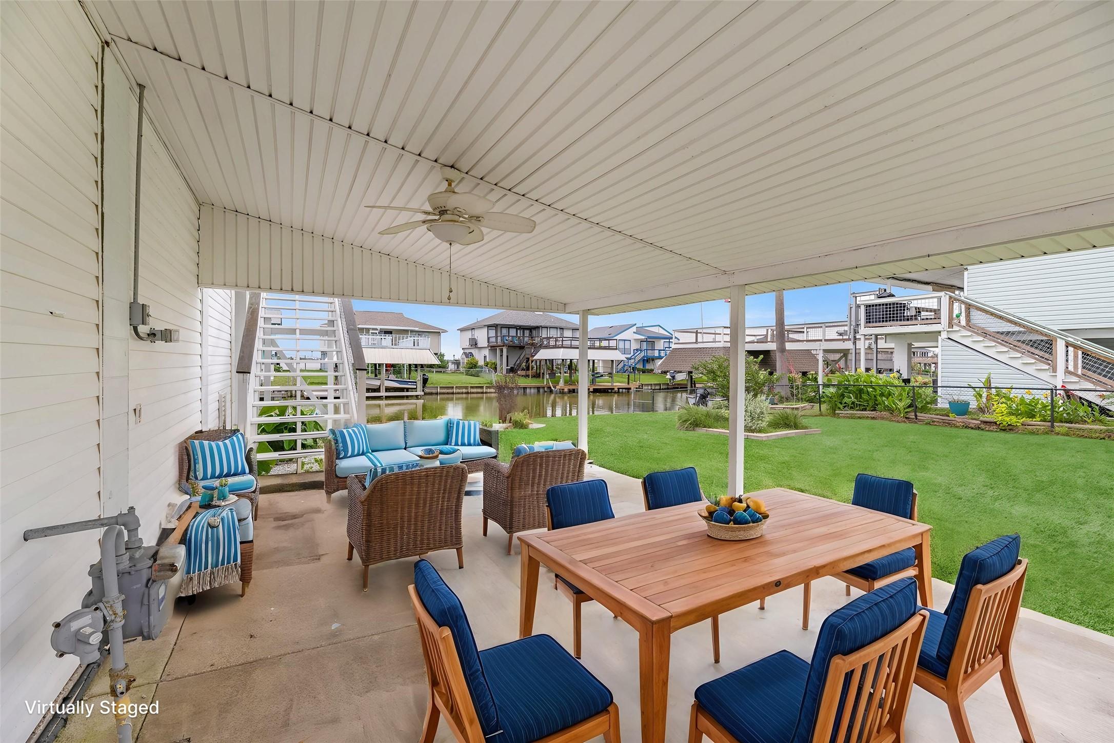 Image 4: Virtually staged side patio and extra lot. **Extra