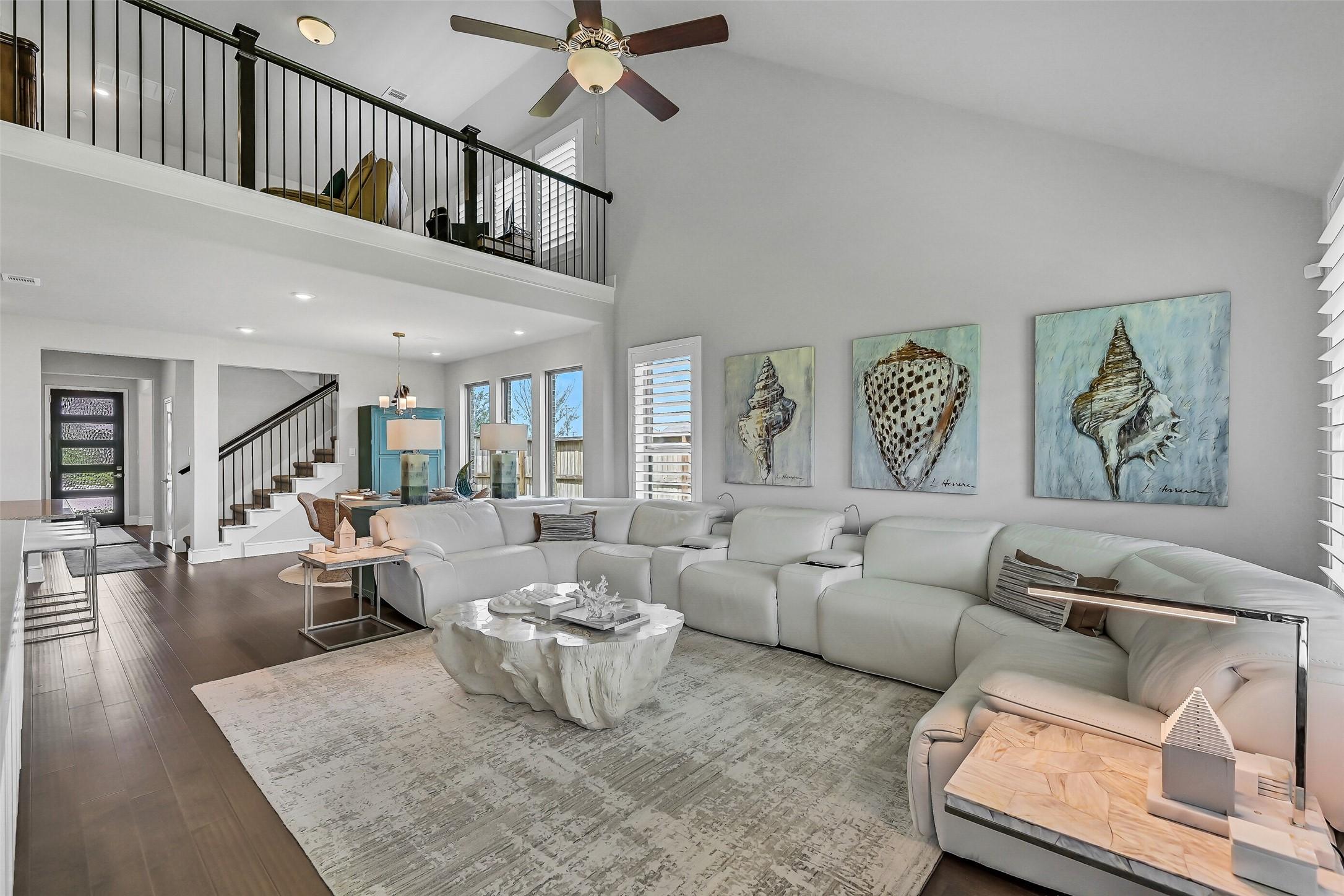 Image 4: The impressive two-story family room showcases soa