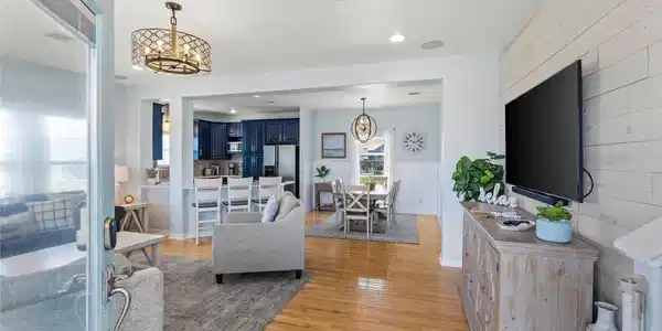 Image 4: View from the front door into the open living and