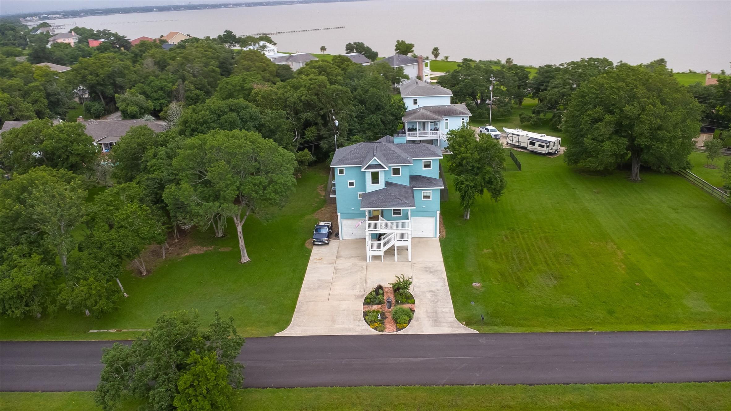 Image 3: The home has bay views from the rear balcony.