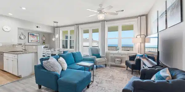 Image 3: Natural light fills the open-concept layout, creat