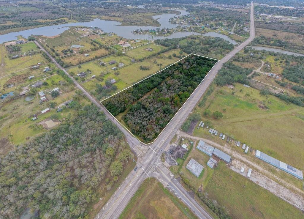 Image 1: 9.8 Acres on hard corner of FM517 and Strom Road
