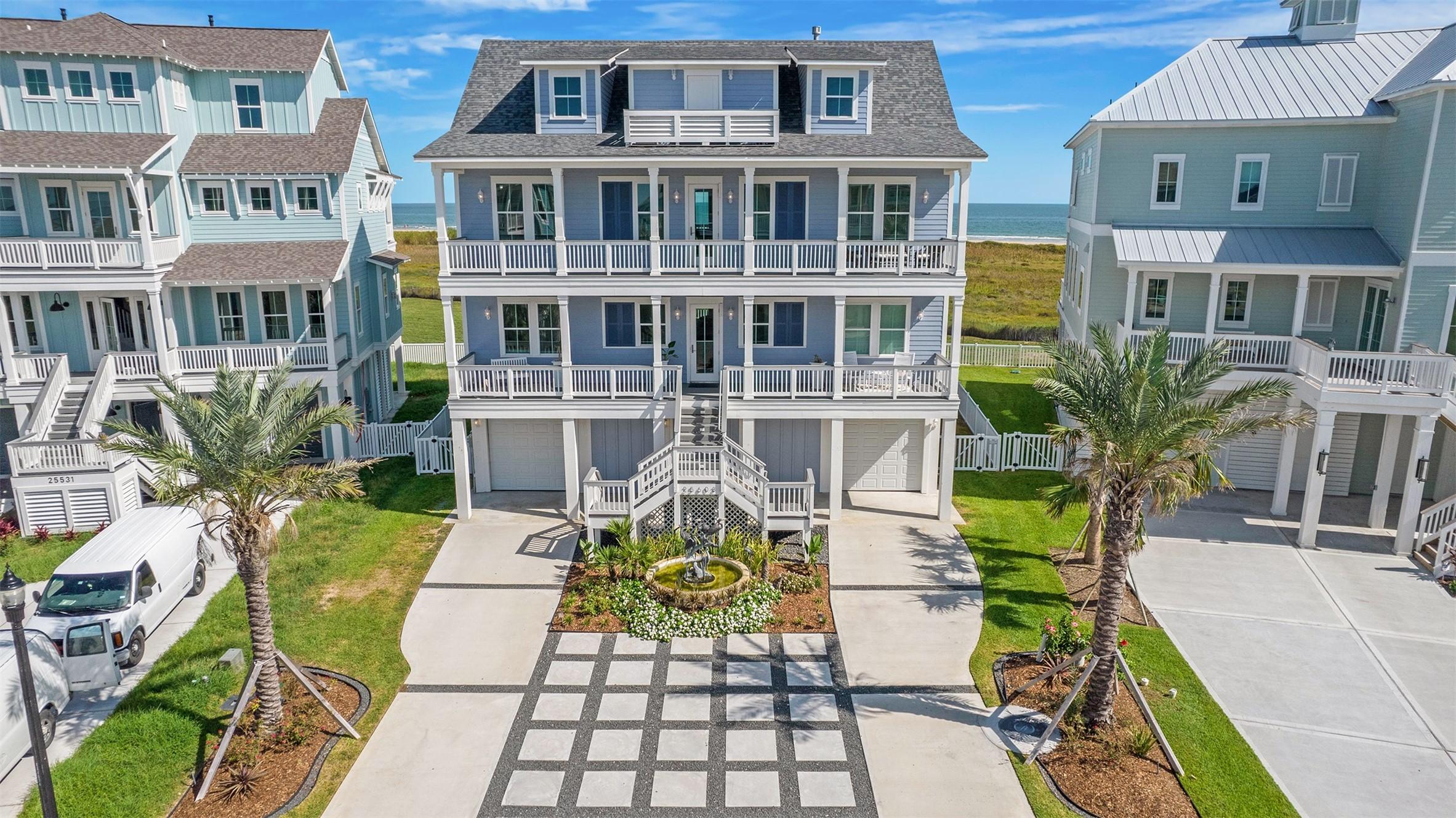 Image 1: Beautiful three story getaway with beachfront and