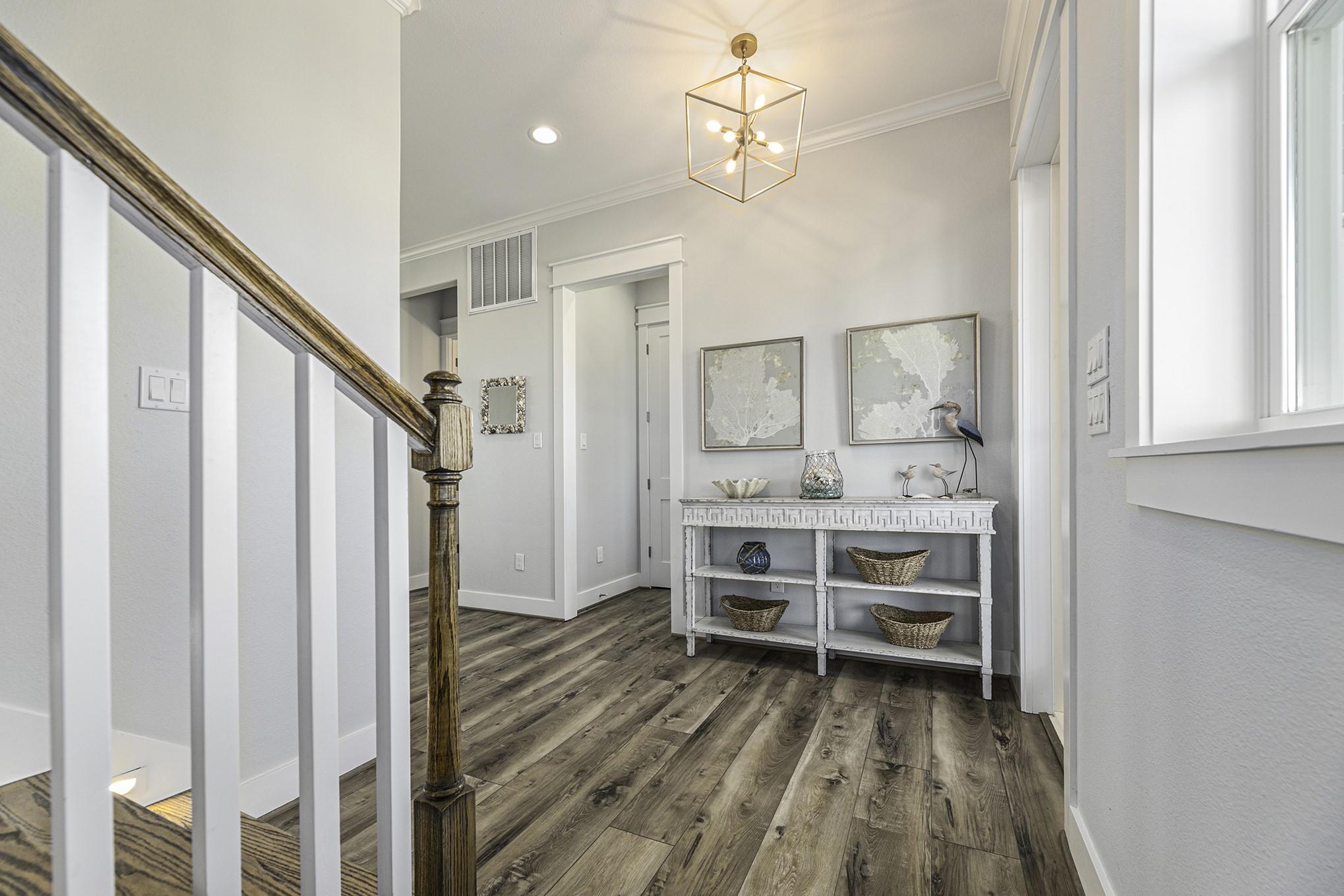 Image 4: Beautiful front entry with access to the stairs.