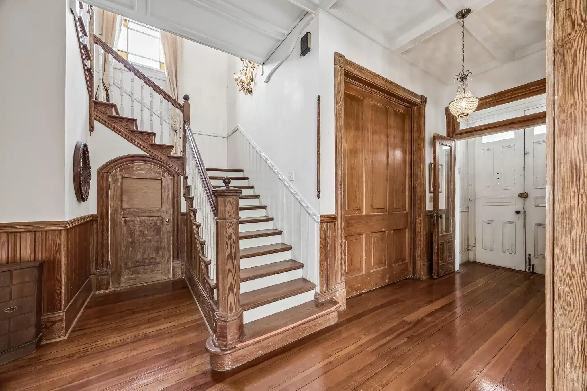 Image 1: The massive pocket door closes off the office. All