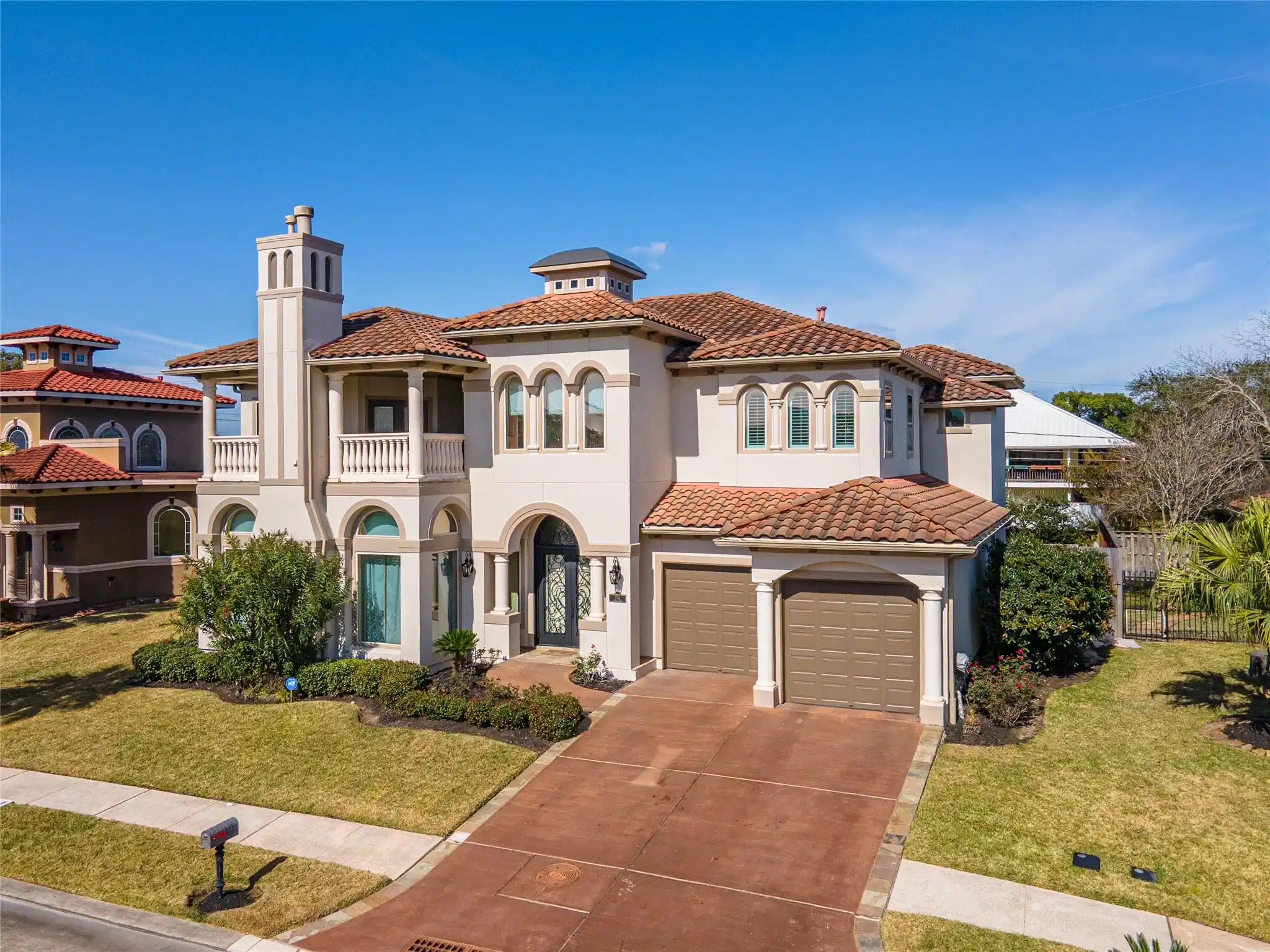 Image 1: This is a stunning Mediterranean-style two-story h