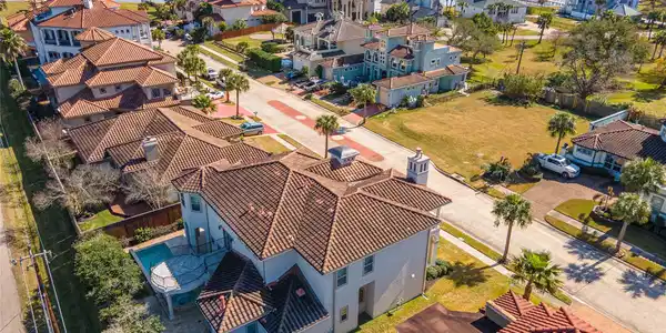 Image 2: This aerial photo showcases a coastal neighborhood