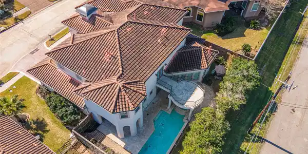 Image 3: This aerial view showcases a spacious Mediterranea
