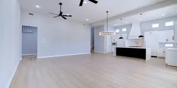Image 3: This photo showcases a spacious, open-concept livi