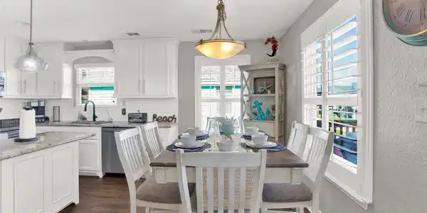 Image 4: Bright dining area perfectly positioned for gather