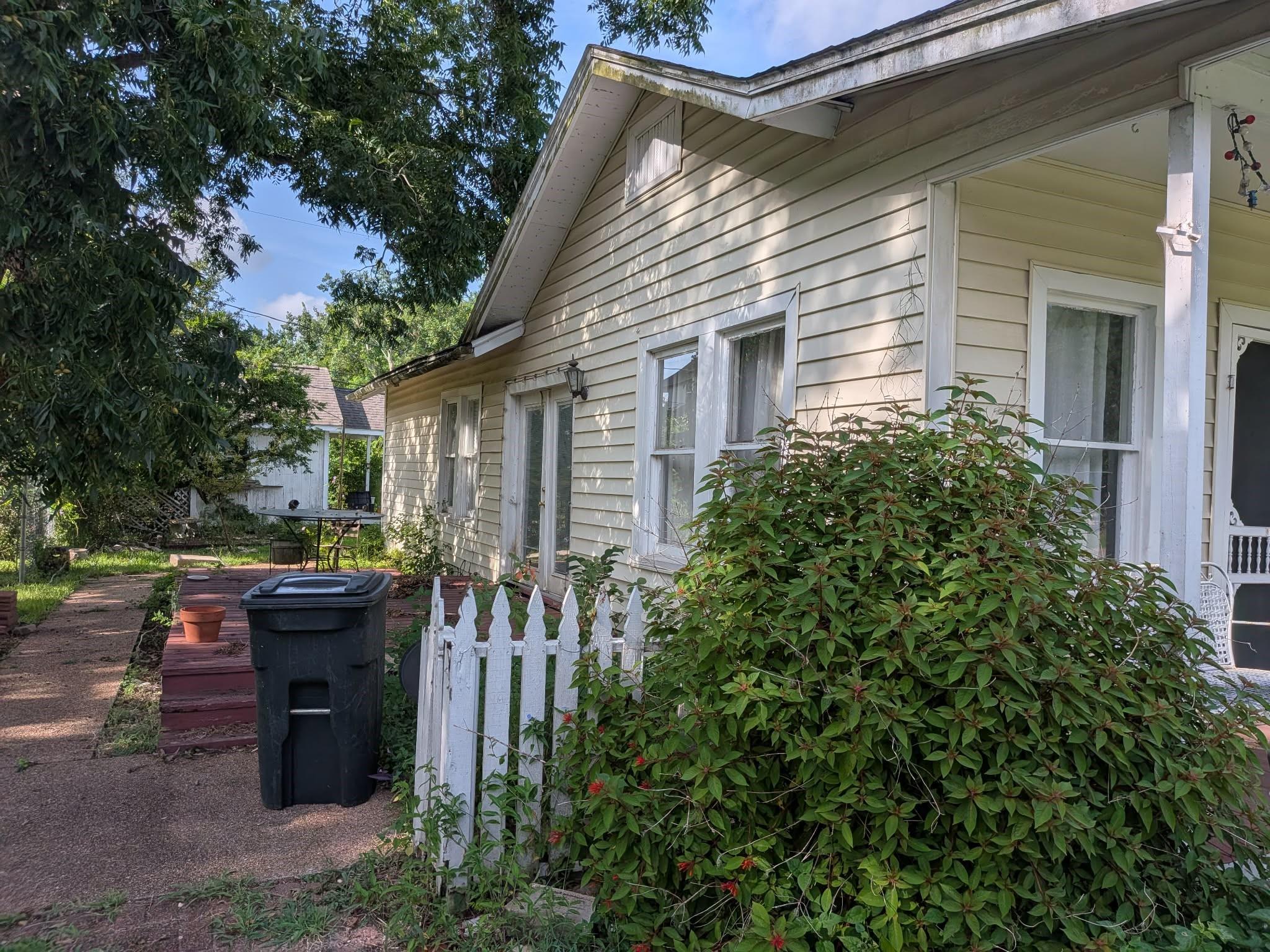 Image 3: left side of the home