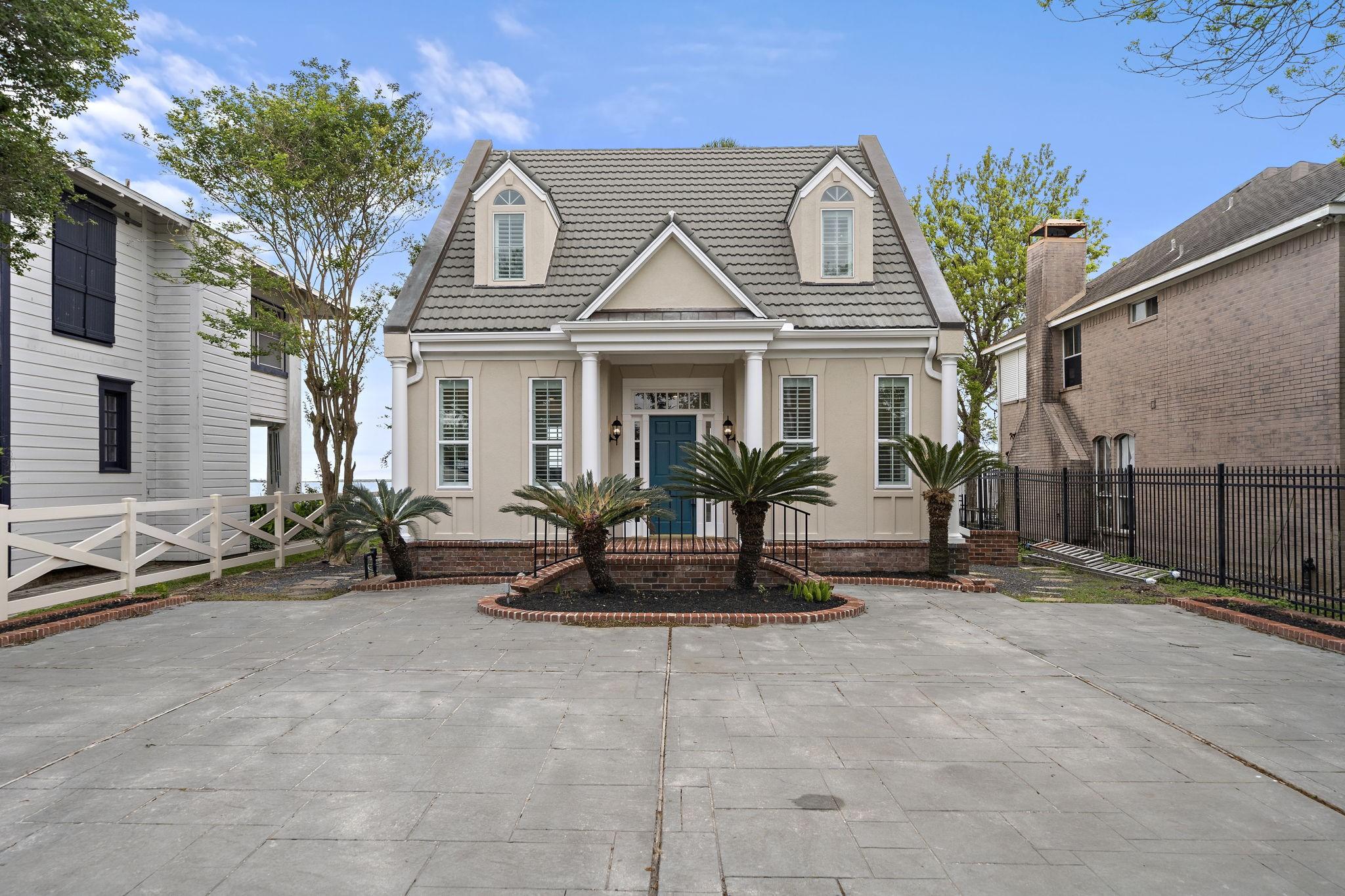 Image 1: front elevation of the home