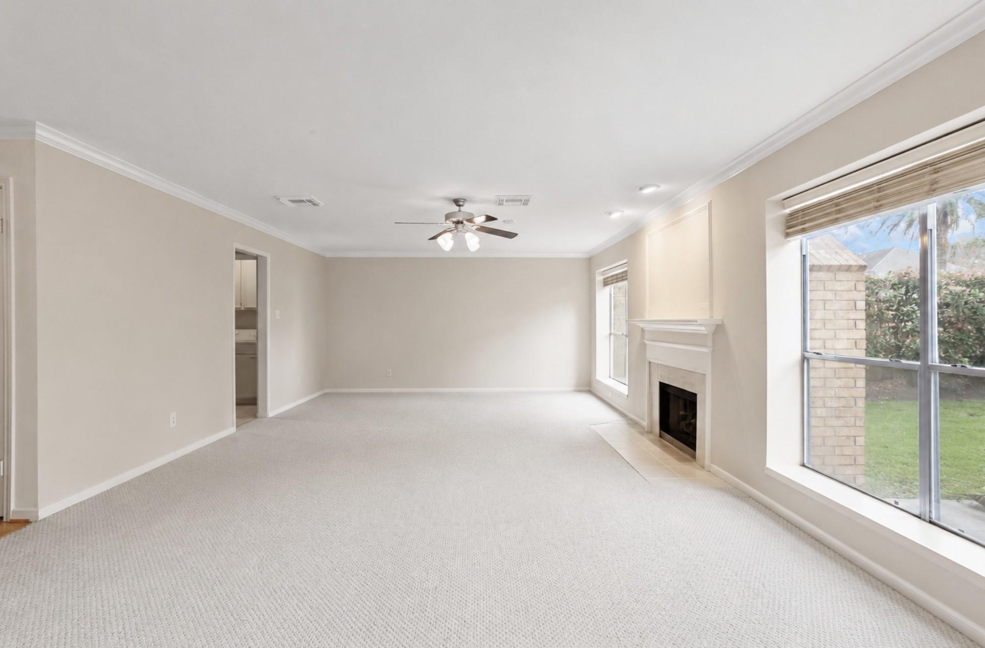 Image 3: Spacious Family Room right off the kitchen.