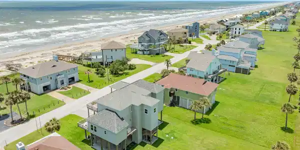 Image 3: The house resides on a 15,000 sq ft lot so plenty