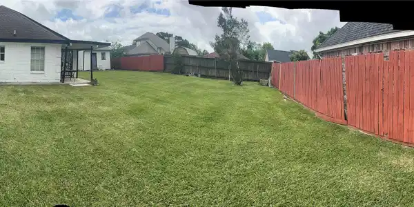 Image 3: LARGE BACKYARD WITH STORAGE SHED