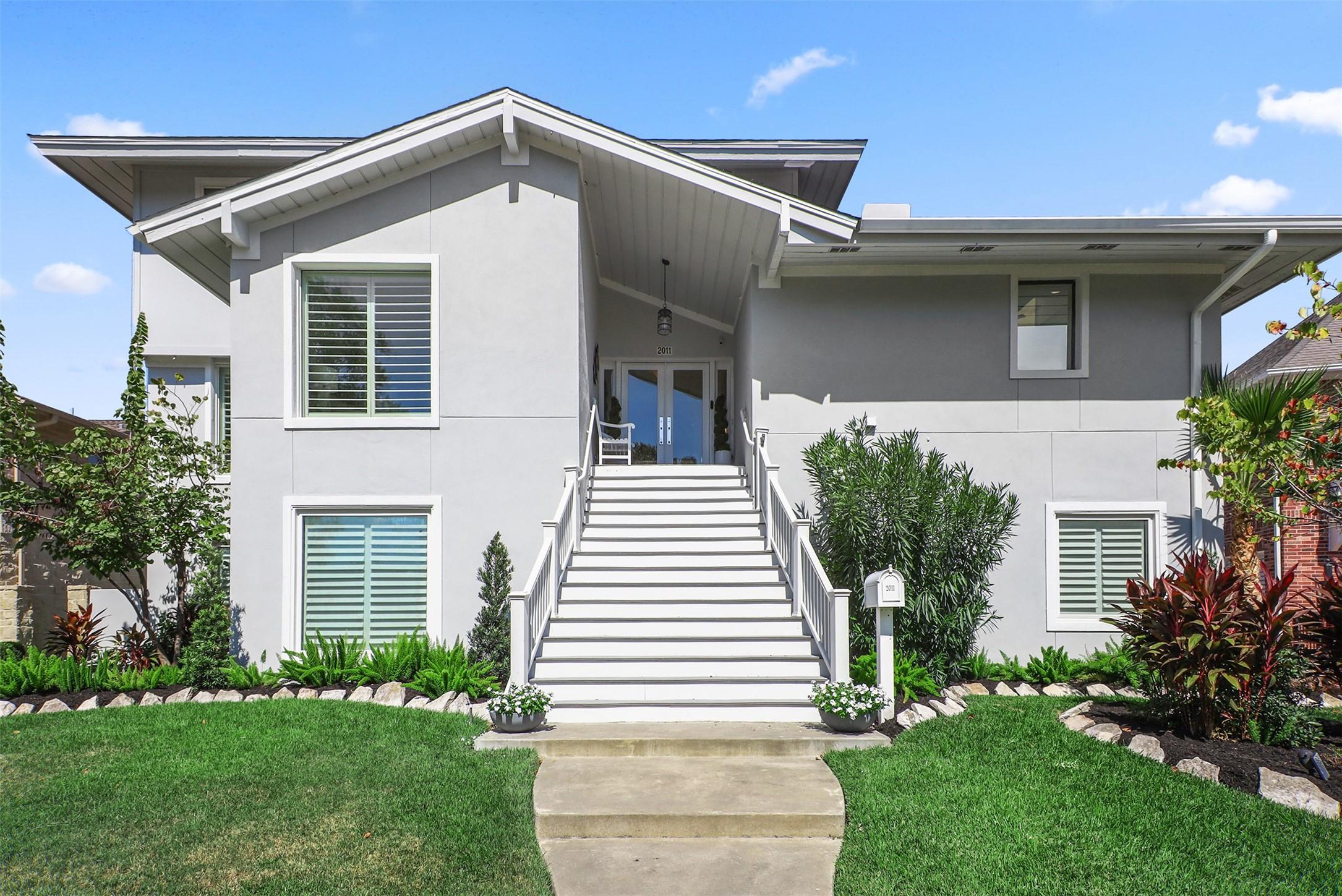 Image 4: Charming front view showcasing the graceful stairc