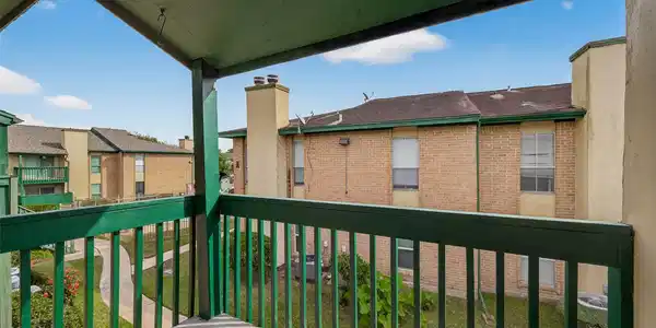 Image 2: PRIVATE BALCONY OFF OF THE DEN.