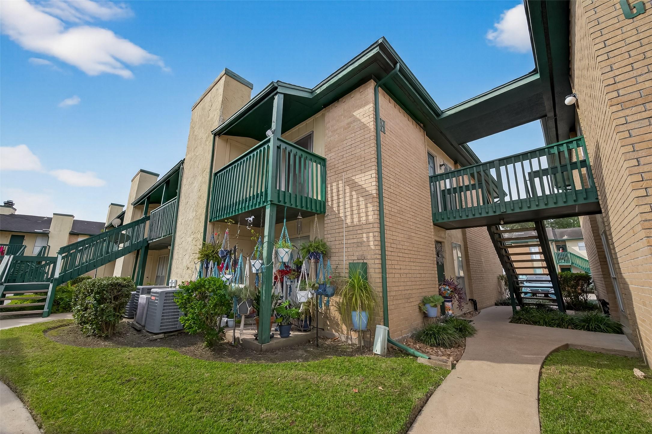Image 3: GROUND VIEW OF THE CORNER, 2ND FLOOR CONDO WITH BA