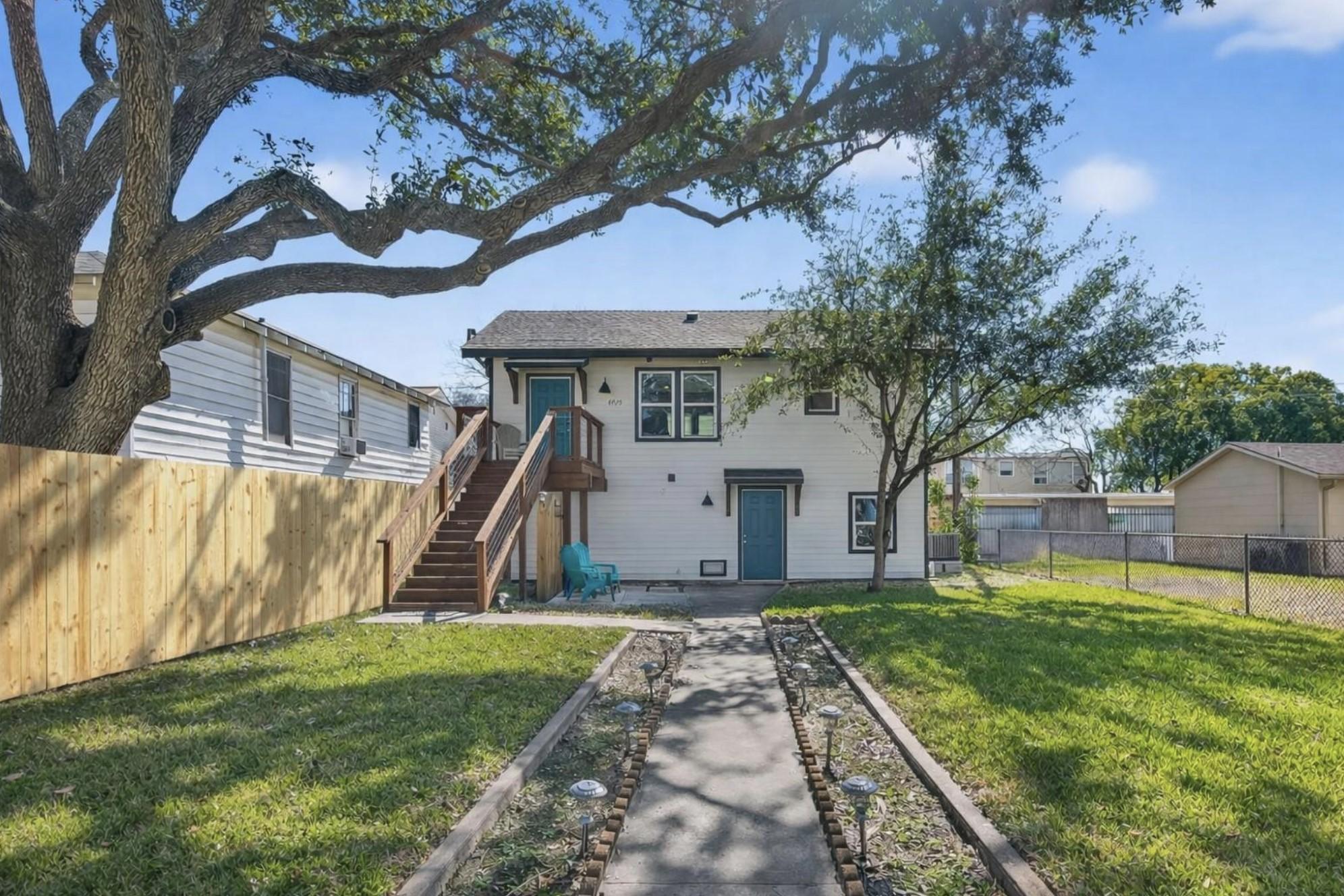 Image 3: Front Yard with new fence