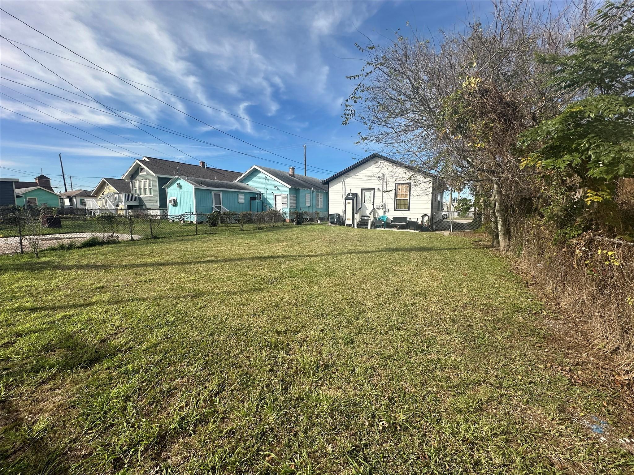 Image 3: This home sits on a large lot with ample yard spac