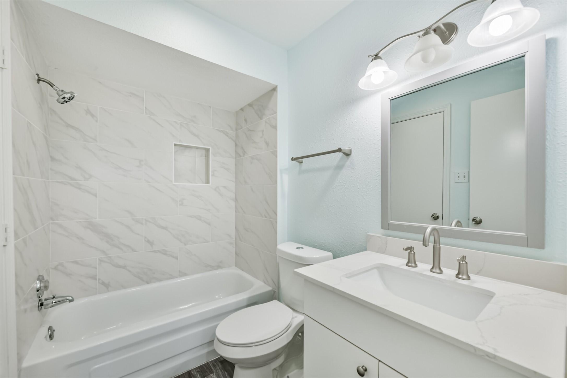 Image 4: Newly remodeled bathroom