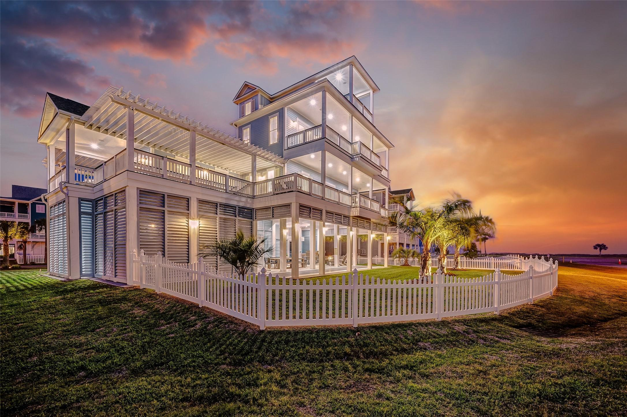 Image 1: Striking coastal residence with exceptional curb a