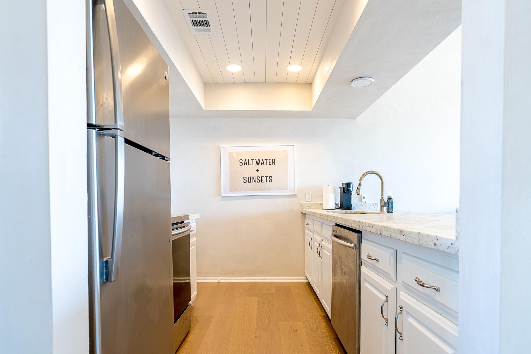 Image 2: Kitchen with extended ceiling.