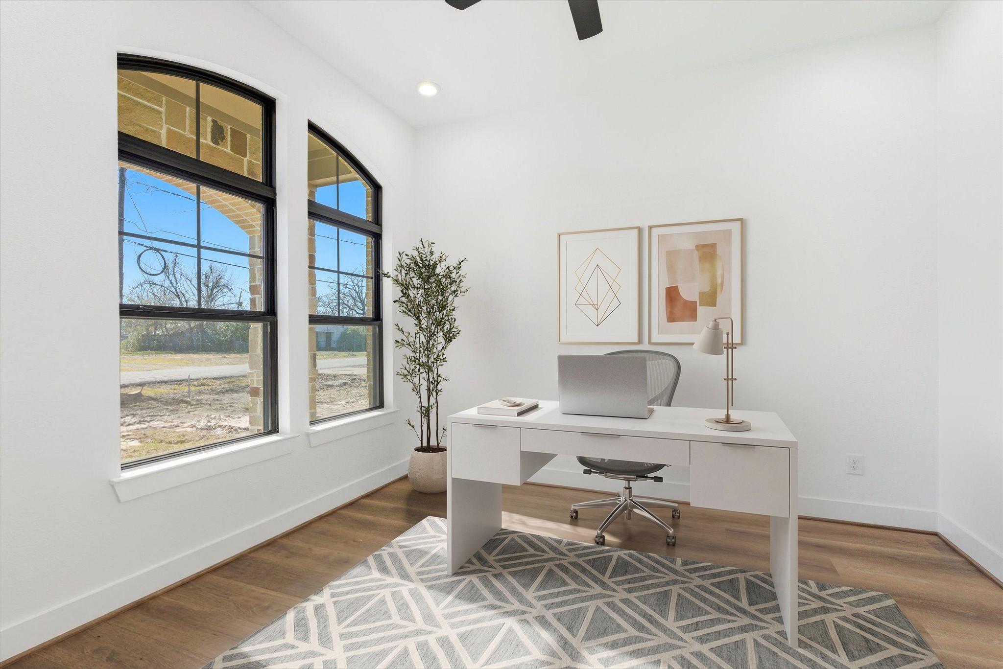 Image 1: A dedicated first floor office features beautiful