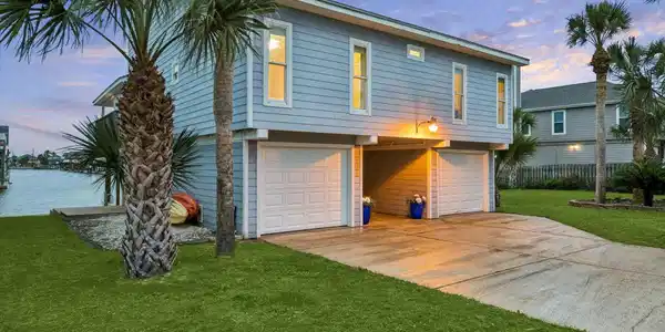 Image 4: Charming waterfront home with a spacious two-car g