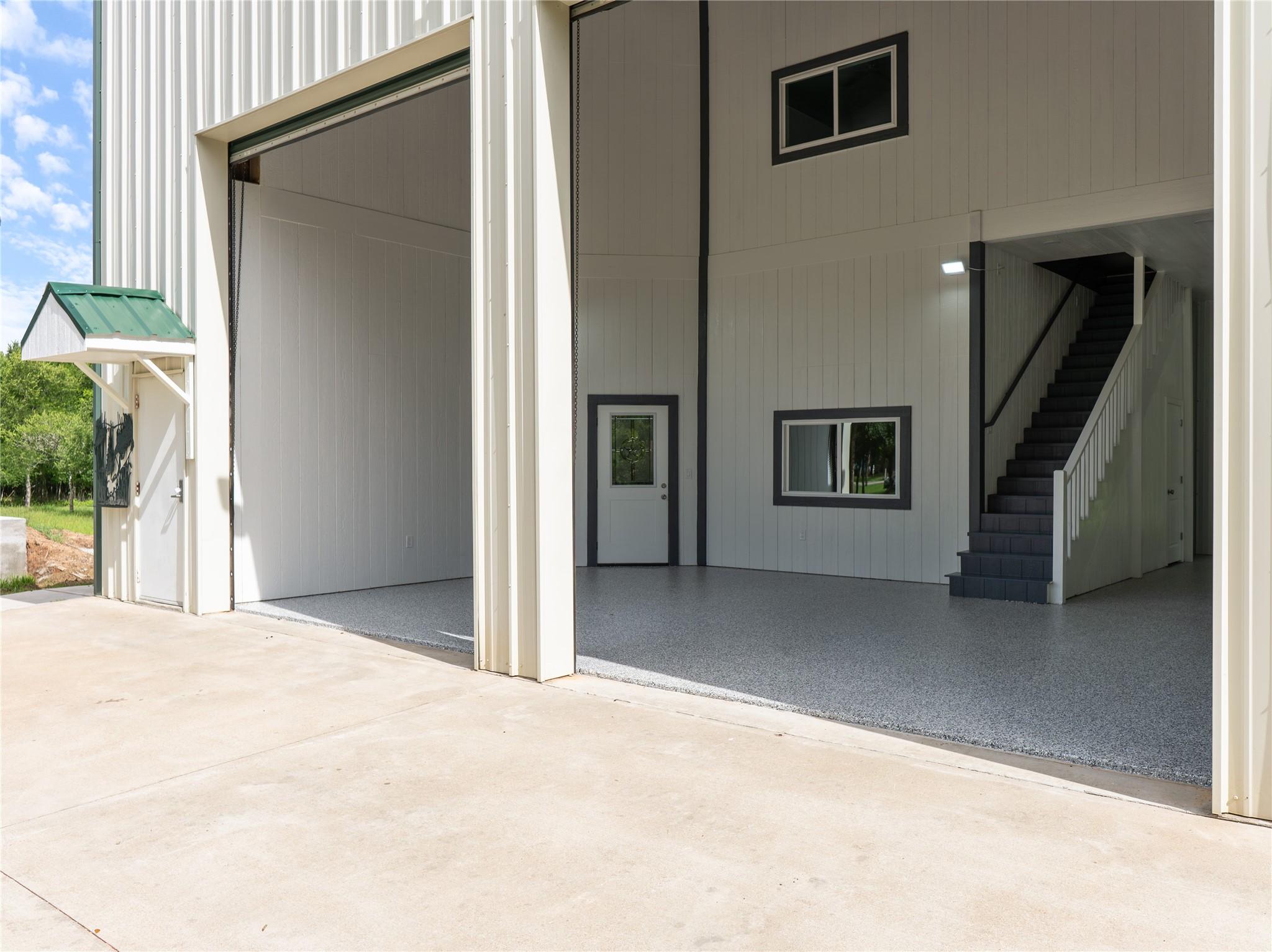Image 3: View of the entrance with the roll doors open into
