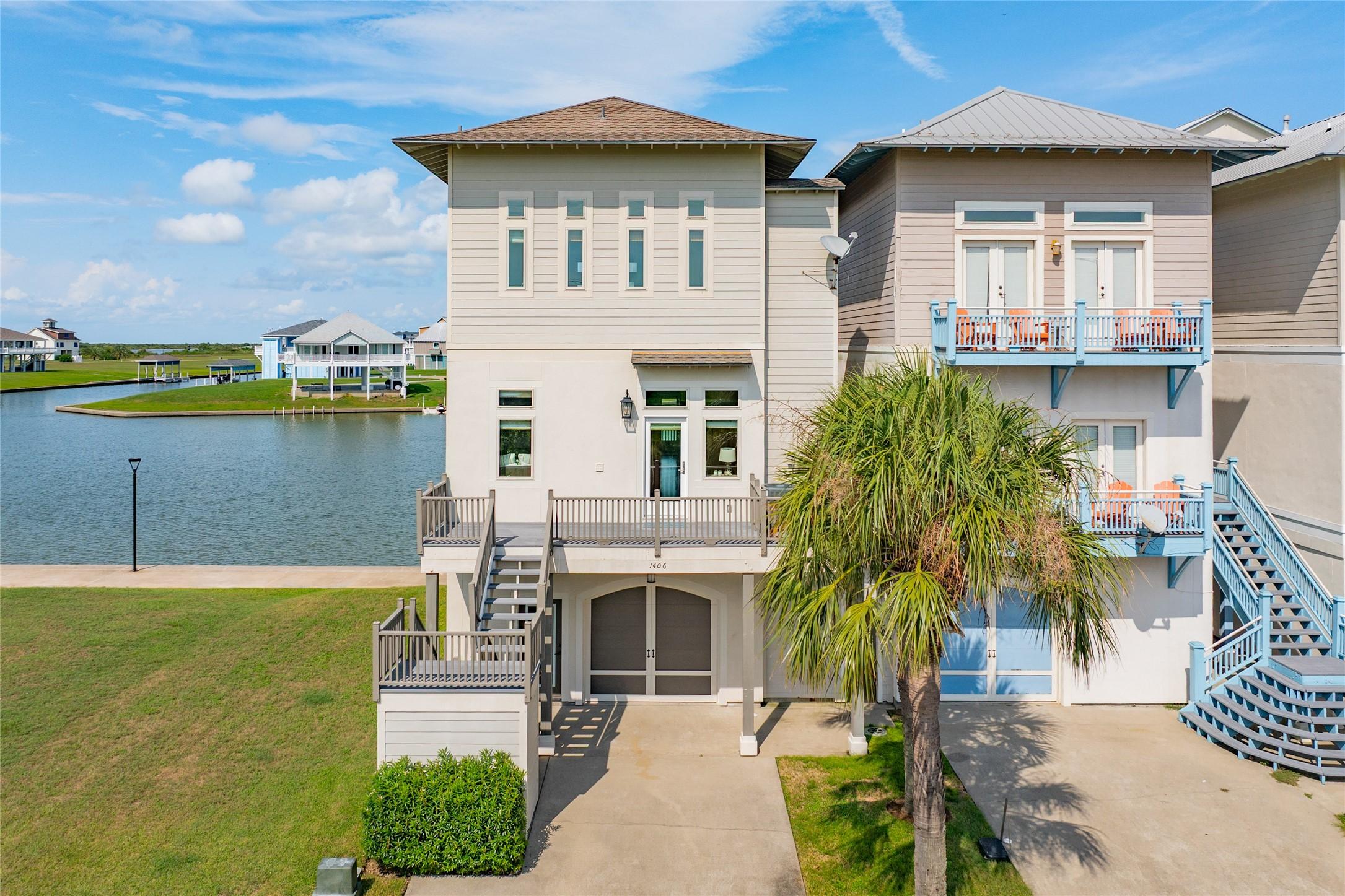 Image 2: Step into this inviting Waterfront corner home.