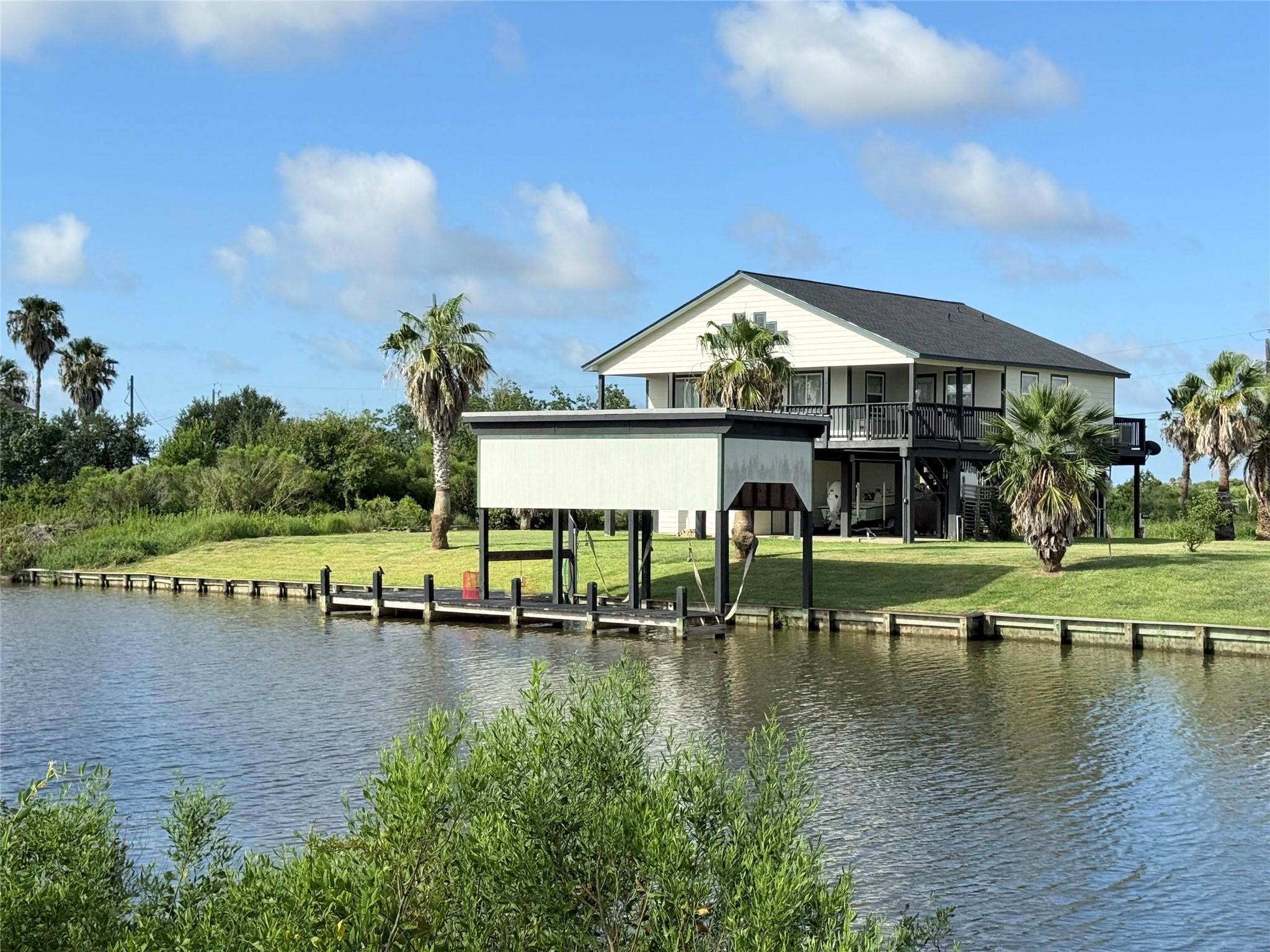 Image 3: Spacious waterfront home with a raised design, sur