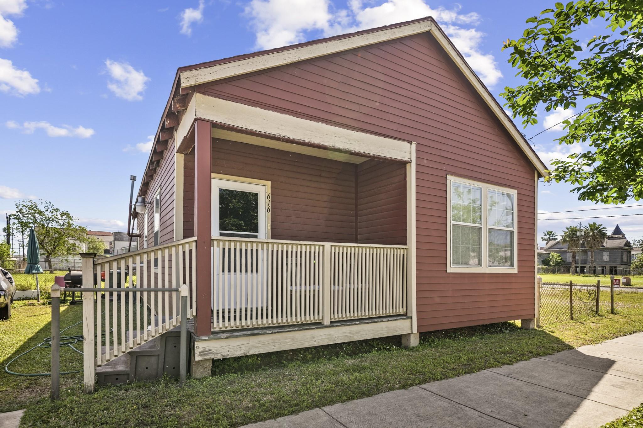 Image 3: Front exterior with classic Craftsman charm - this