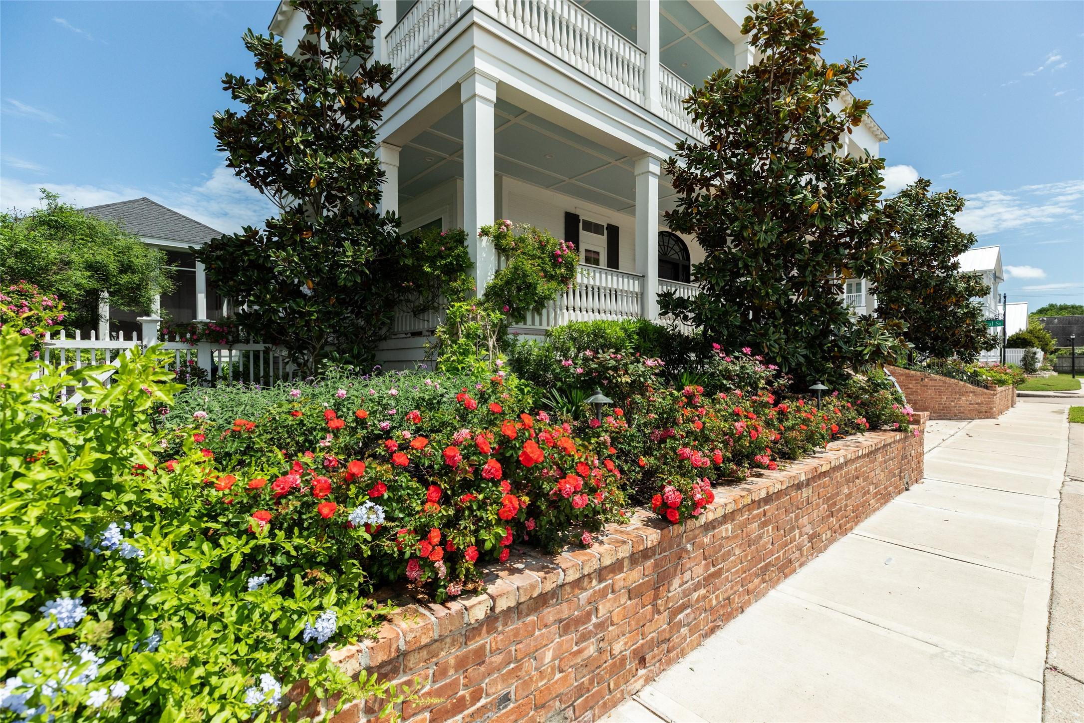 Image 4: Stunning landscape and tremendous curb appeal.
