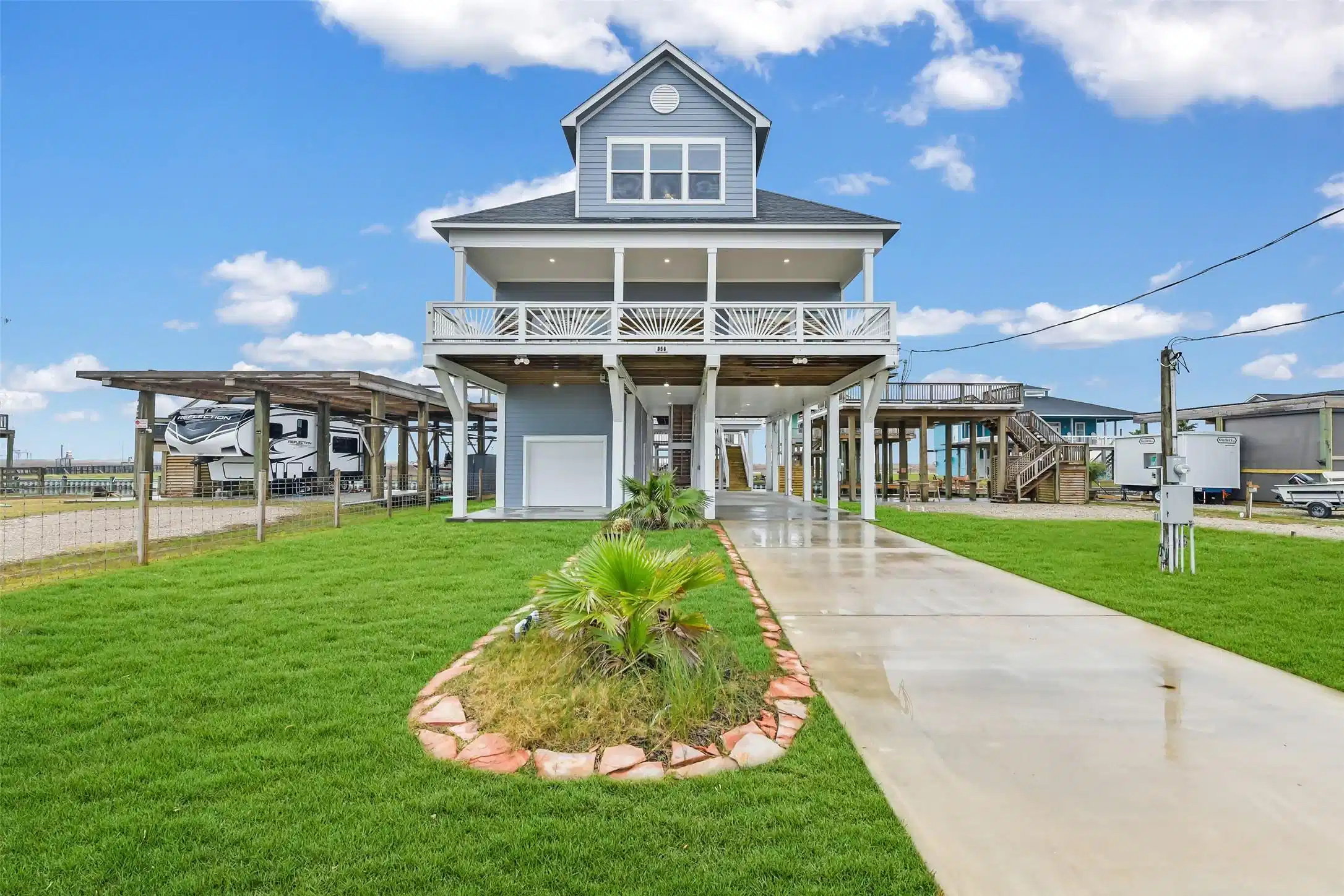 Image 1: This stunning canal front home features a classic