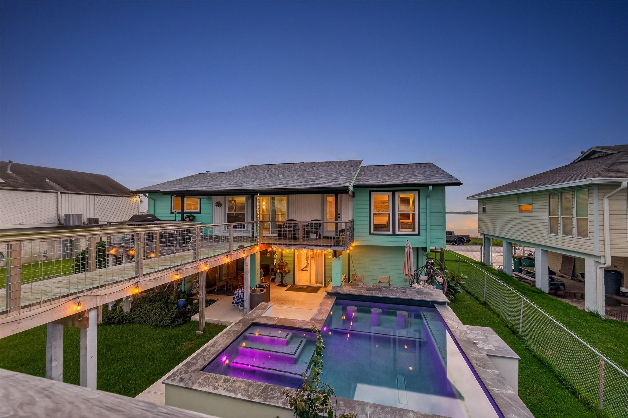 Image 3: Added a fabulous pool with swim up seating and bar