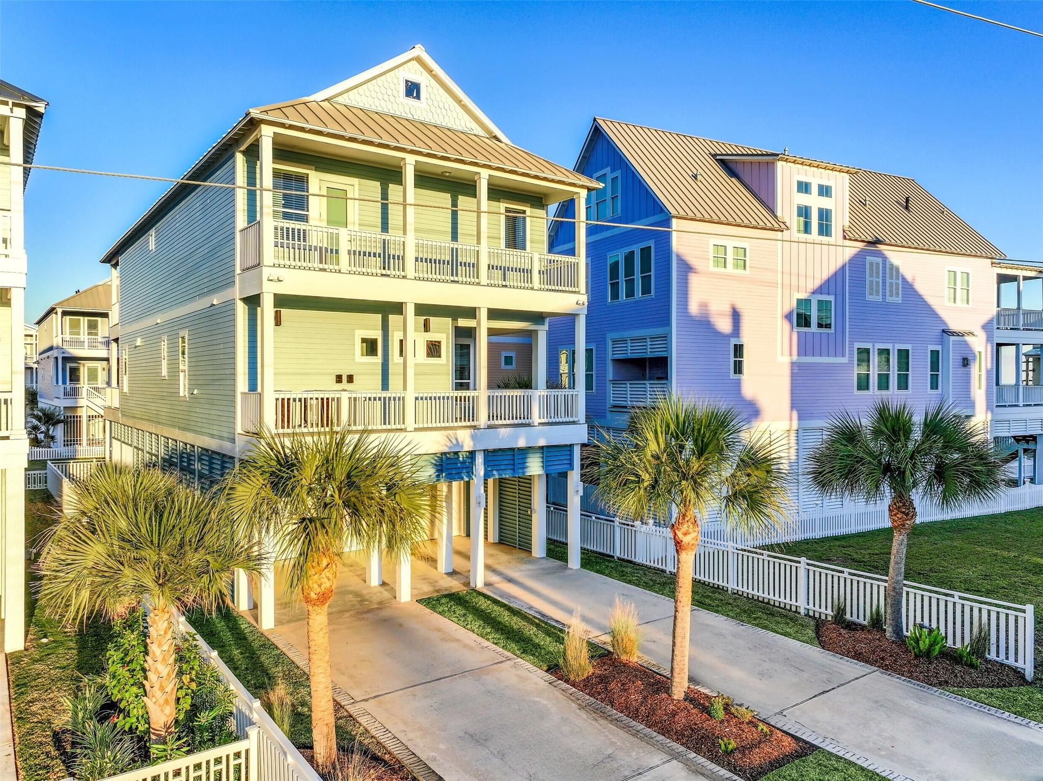 Image 2: The exterior of the home boasts a double driveway,