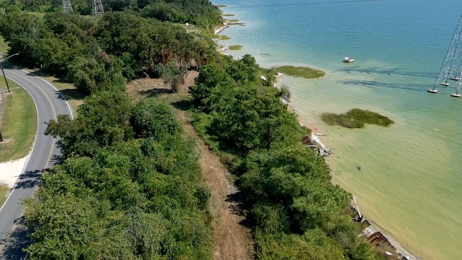 Image 1: 52 acre tract has Tabbs Bay frontage and extends a